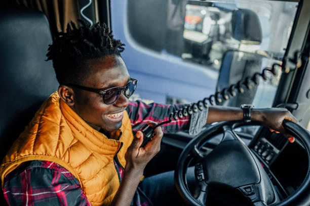 istock Male truck driver having a conversation via CB radio 2107089028
