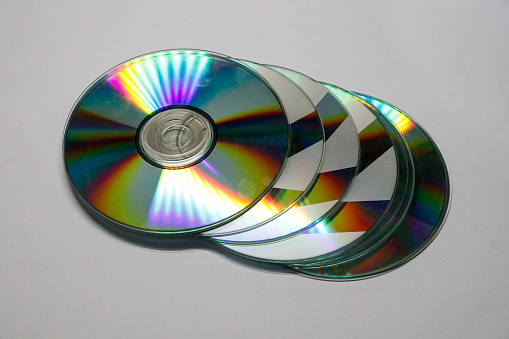 the forgotten medium, stack of compact disc, isolated.