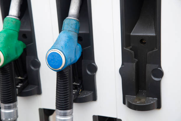 A gun for refueling cars with fuel.Rising fuel prices. The concept.