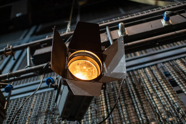 istock theater spotlight above the stage 2107105211