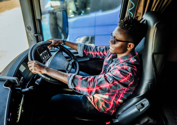 istock Male driver sitting in the truck 2107116580