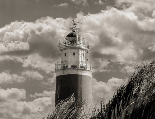 istock View between the dunes of the lighthouse 2107171772