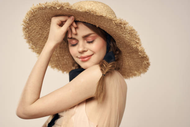 istock woman with hat elegant style luxury travel model 2107236221