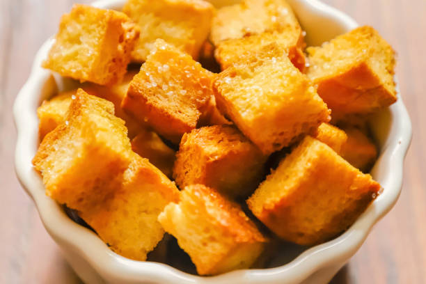 istock Toasted croutons with salt dried breadcrumbs 2107248323