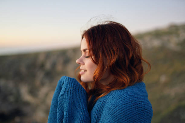 istock woman outdoors landscape mountains fresh air blue plaid 2107257134