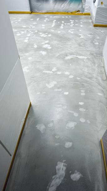 istock The new utility room, floor laying 2107292088