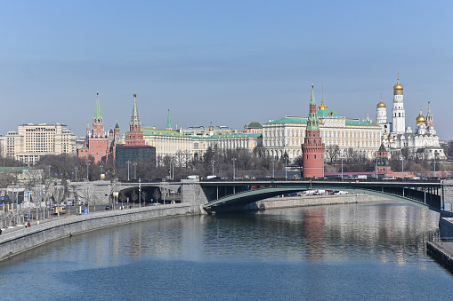 Moscow panorama at night - view to The Kremlin and Sofiyskaya embankment from Bolshoy Moskvoretsky Bridge. Cloudless sky is on the background.