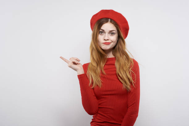 istock pretty woman hand gesture fun Red lips luxury isolated background 2107302611