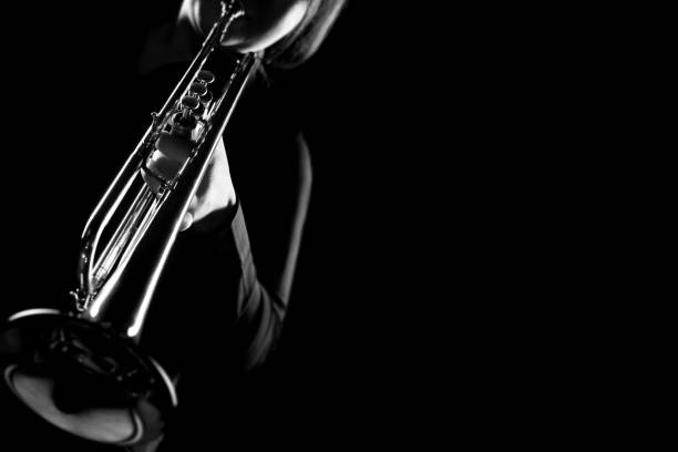 istock Trumpet player. Trumpeter playing jazz 2107355160