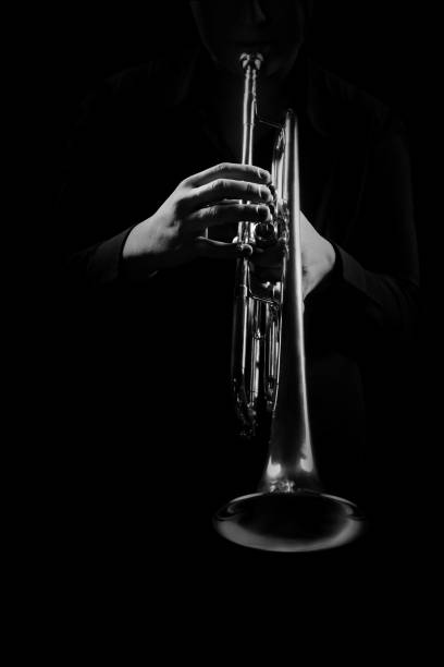 istock Trumpet player hands playing jazz music instrument 2107355679