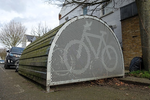 Kilburn, London, England, UK - March 22nd 2024: Cyclehoop Bikehangar secure on-street cycle parking shelter