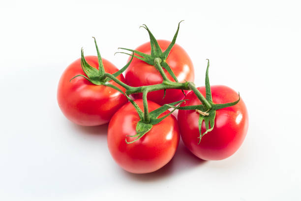 istock Tomatoes on isolated background fresh organic 2107392131