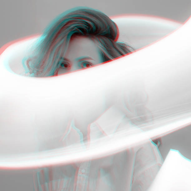 istock Abstract woman studio portrait with light painting technique in RGB color split effect style 2107445852