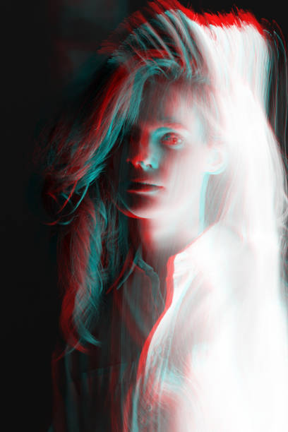 istock Abstract woman studio portrait with light painting technique in RGB color split effect style 2107446393