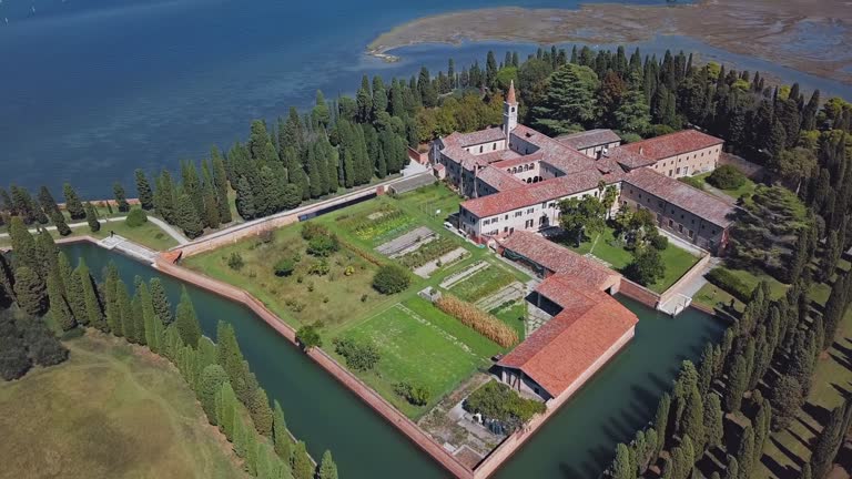 Aerial view of San Francesco del Deserto island and Franciscan monastery in Venetian Lagoon, Italy