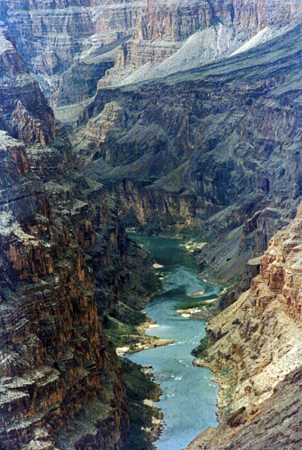 The rugged basalt cliffs from Vulcans Throne above the Volcano Rapids of the Colorado River as seen from the the spectacular Toroweap edge along the North Rim of Grand Canyon National Park.