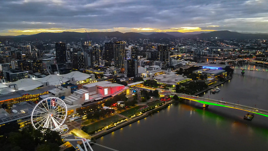 Aerial drone view of South Bank at Brisbane, QLD, Australia along Brisbane River during the late afternoon in March 2024