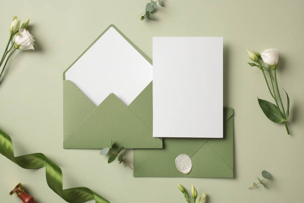 istock Wedding stationery set on green background. Top view. 2107516762