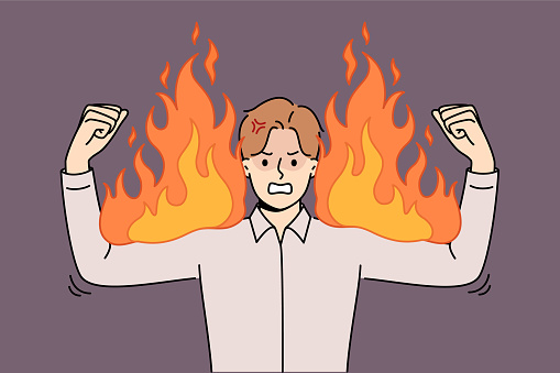 Angry business man experiencing anger and rage, showing burning biceps symbolizing strength and power. Corporate manager demonstrates anger after learning about mistakes made by subordinates