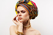 pretty oriental woman multicolored turban jewelry bare shoulders luxury