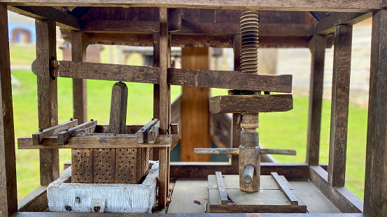 Medieval wooden oil press tool actioned manually from Transylvania