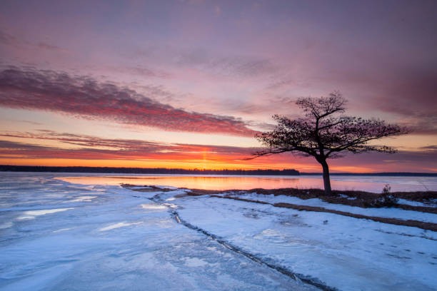 istock Detroit Point Sunrise Spring Thaw Orange Sunrise 2107576808