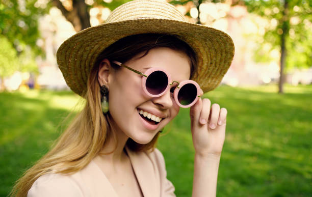 istock cheerful woman nature rest green grass fun 2107576811