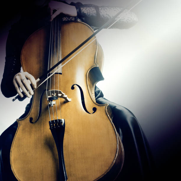 istock Cello player. Musician cellist playing violoncello 2107599772