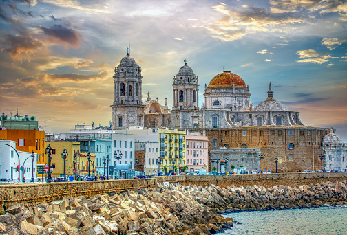 Panoramic view of Cadiz at sunrise with its cathedral, Spain.