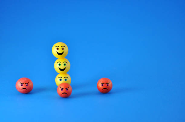 istock Happy faces achieving a goal and others angry for not achieving them 2107618888