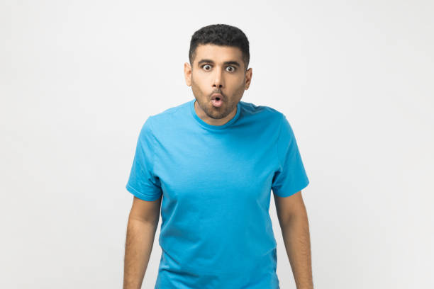 istock Amazed shocked surprised unshaven man looking at camera with big eyes, sees something astonished. 2107683953