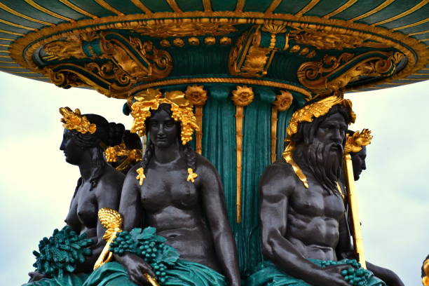 We can see the different characters from the sculpture, representing gods. Close up view of the sculpture.