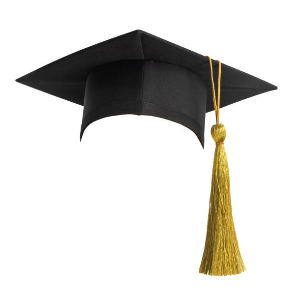 Graduation Cap And Diploma On Table With Books