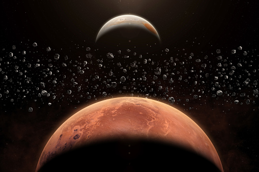 Mars, Jupiter, main asteroid belt, nebula and galaxy. Asteroids orbiting our Sun between Mars and Jupiter within the main asteroid belt. Beautiful dark space wallpaper. This image elements furnished by NASA. ______ Url(s):\nhttps://photojournal.jpl.nasa.gov/catalog/?IDNumber=PIA23344\n  https://photojournal.jpl.nasa.gov/catalog/PIA22946