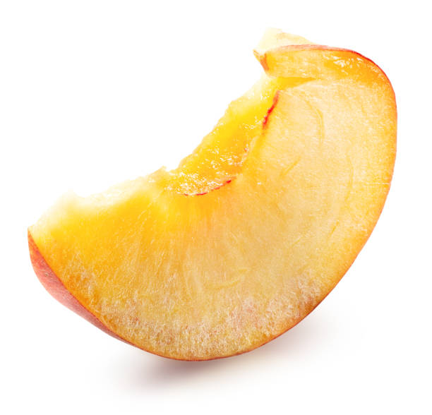 istock slice of peach isolated on the white background with clipping path 2108051404