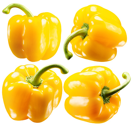 collection of the yellow peppers isolated on the white background.