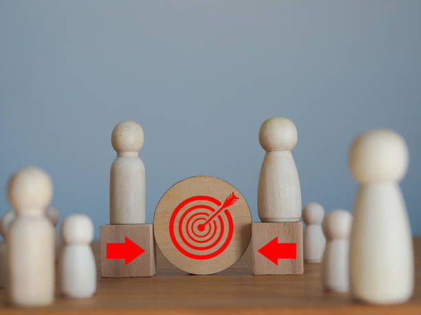 istock The arrow points to a single target, two groups of people. 2108100042