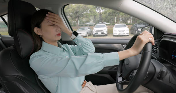 istock businesswoman feeling depressed in car 2108117209
