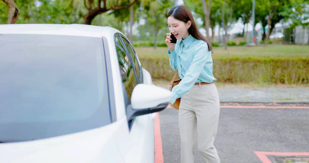istock Asian female preparing to drive 2108121955