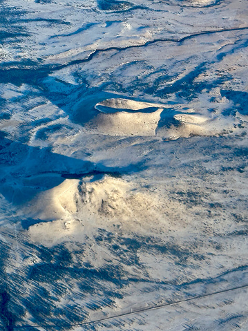 aerial view of craters covered in snow at ‎⁨Tonto National Forest⁩, ⁨Mesa⁩, ⁨Arizona⁩, ⁨United States⁩