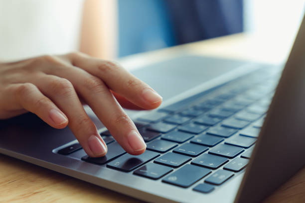 istock Businesswoman hand typing on the computer keyboard in the office. 2108264132