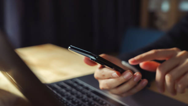 istock The business manager uses a smartphone and its apps for customer support, including email, chat, and phone communication. 2108265162