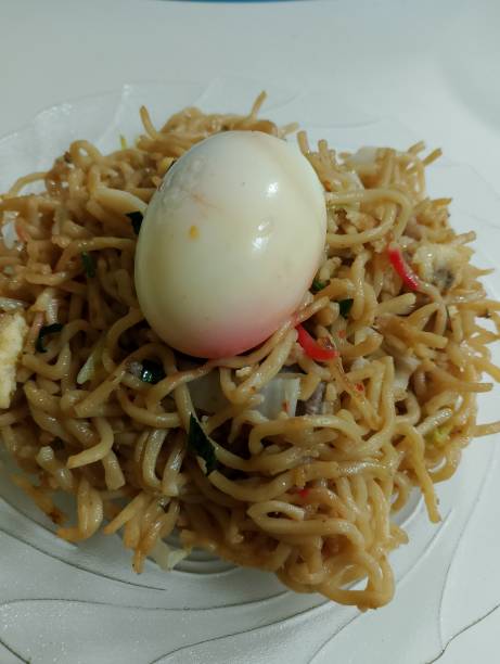 istock Spicy Asian Fried Noodles with boiled egg 2108321915