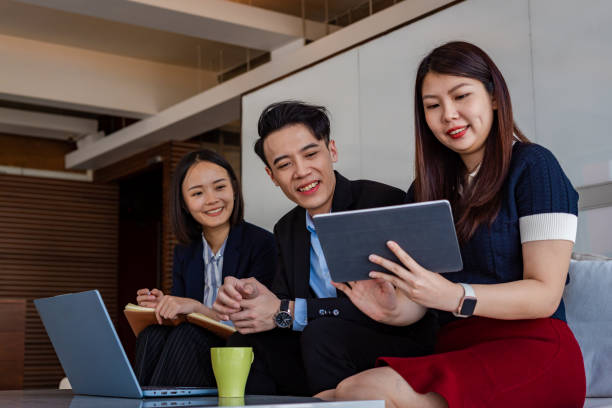 istock Office Alliance: Professionals Engaged in Strategic Discussions 2108334386