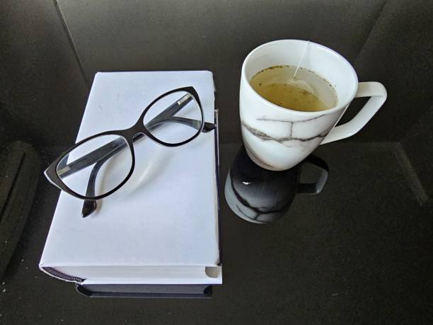The secret to a well-balanced life is a cup of tea in one hand and a book in the other.