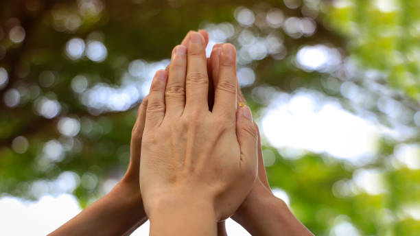 istock Teamwork Concept,Group of diversity people to greeting power tag team,Teamwork Join Hands Partnership Concept of people putting their hands together,Friends with hands showing unity. 2108367180