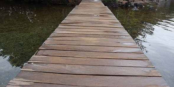 wooden pier on Lake Matano, Sorowako, South Sulawesi. Indonesia