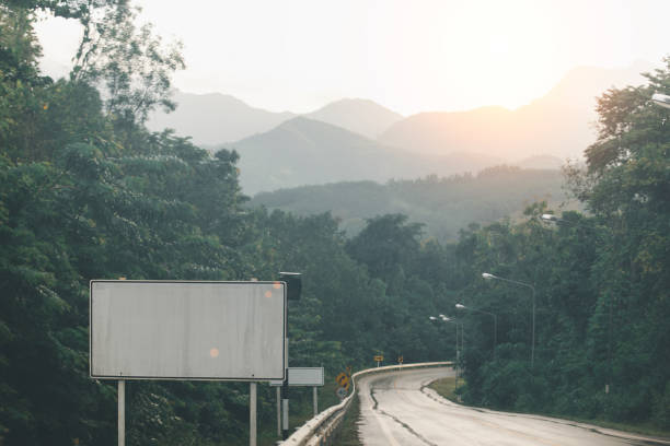 istock Blank Billboard on a Misty Mountain Road 2108474415