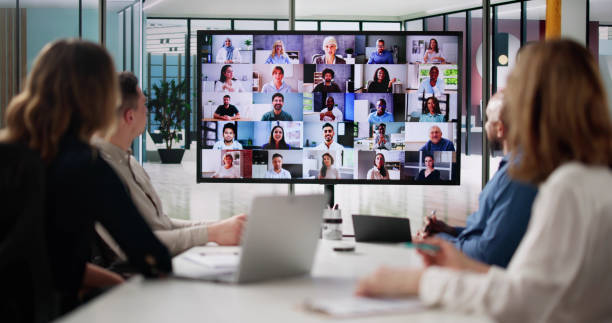 istock Group Of Businesspeople Having Video Conference 2108476104