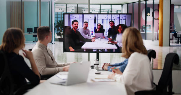 istock Group Of Businesspeople Having Video Conference 2108476106